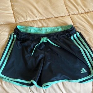 Navy and aqua adidas athletic shorts. Good condition.